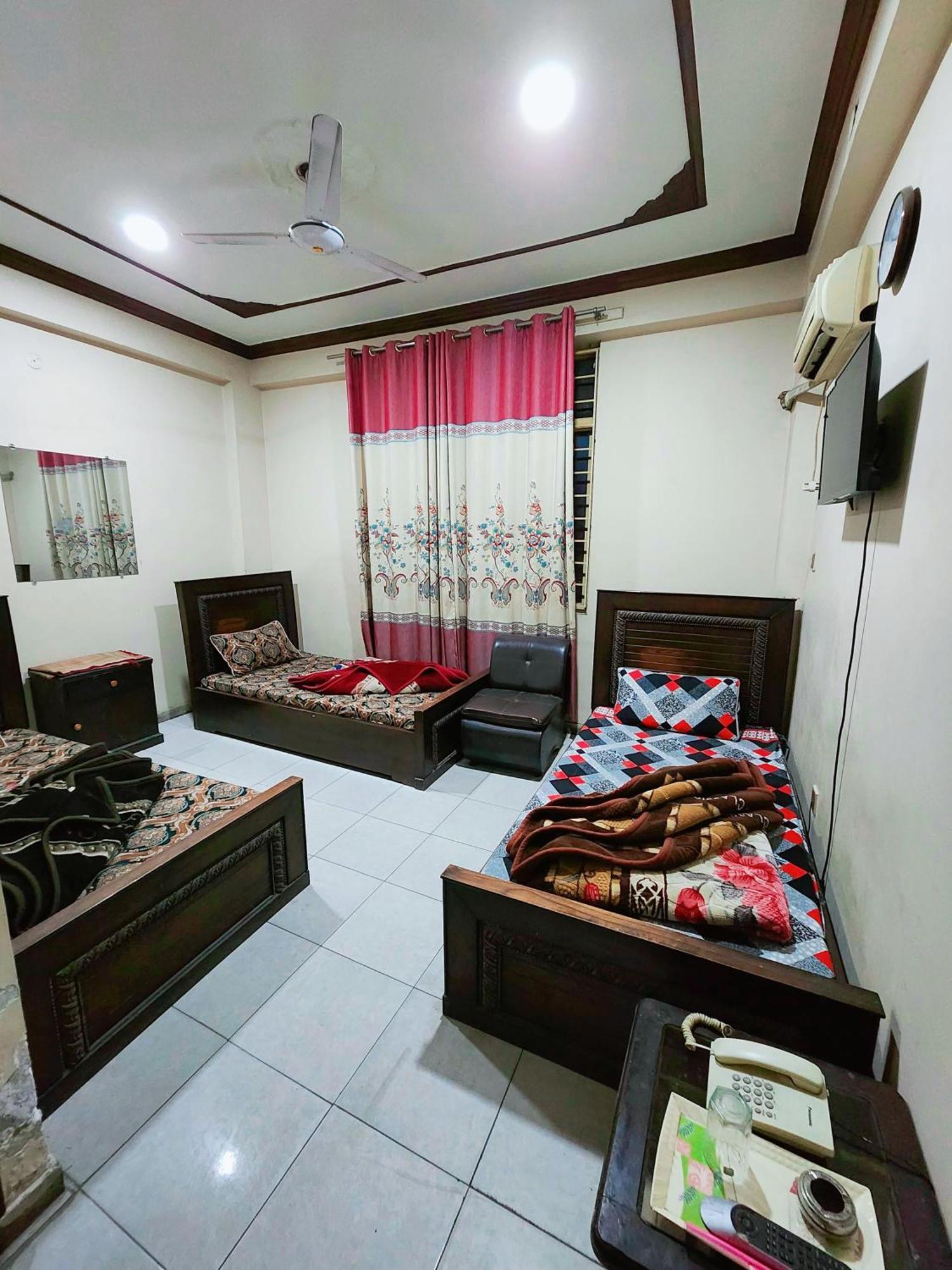Hotel New Taj International Rawalpindi Bagian luar foto